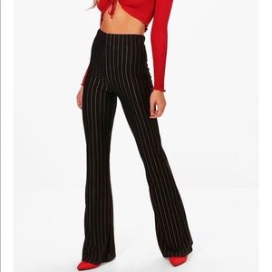 Black pants with vertical stripes
